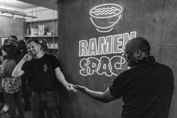 People talking at Ramen Space in Dalston